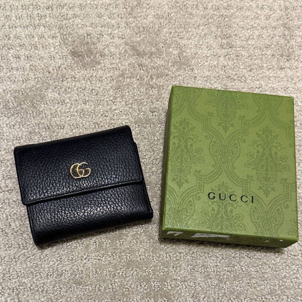 Gucci Black Leather Wallet with Gold Emblem